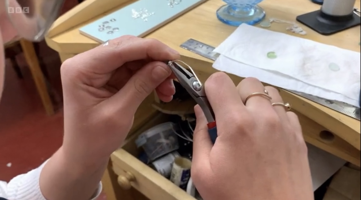 Sadie Jewellery founder Sadie crafting sea glass jewellery in her studio, featured on BBC’s Escape to the Country.