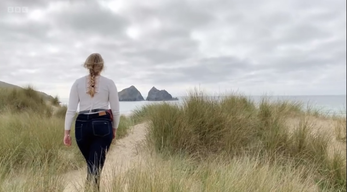 Sadie Jewellery designer beachcombing for sea glass at Holywell Bay in Cornwall, featured on Escape to the Country BBC